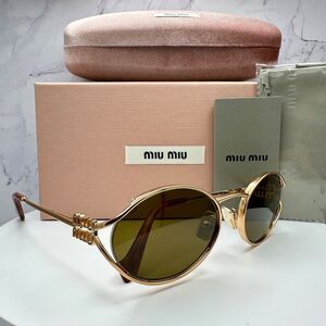 Miu Miu SMU 14G 3AK 3N1 135 brown leopard print sunglasses Miu Miu | Accessories | Miu Miu Smu 4g 3ak 3n1 135 Brown  main image 4